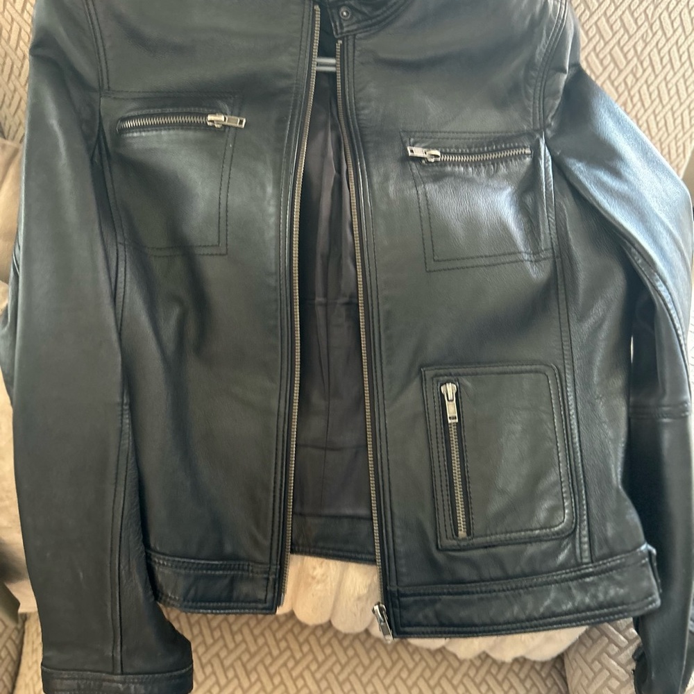 Black Leather Jacket with Zipper Details